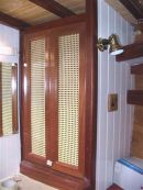 Hanging clothes locker in forecabin